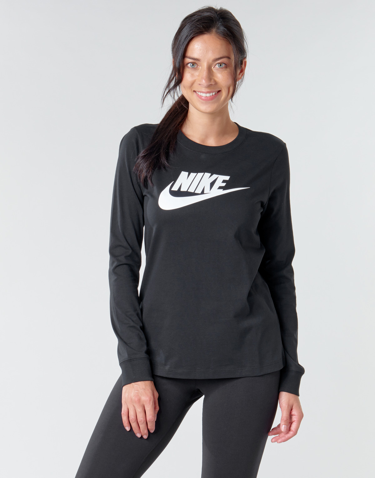 Vêtements Femme T-shirts manches longues Nike pages W NSW TEE ESSNTL LS ICON FTR Noir