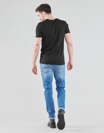 T-shirts Manches Courtes Calvin Klein Jeans BAE Noir - Livraison Gratuite 