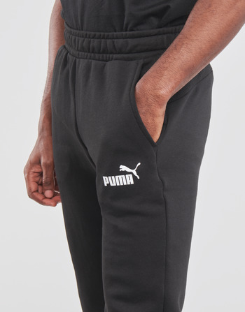 Pantalons de survêtement Puma ESS LOGO SLIM PANT LOGO FL CL Noir - Livraison Gratuite 