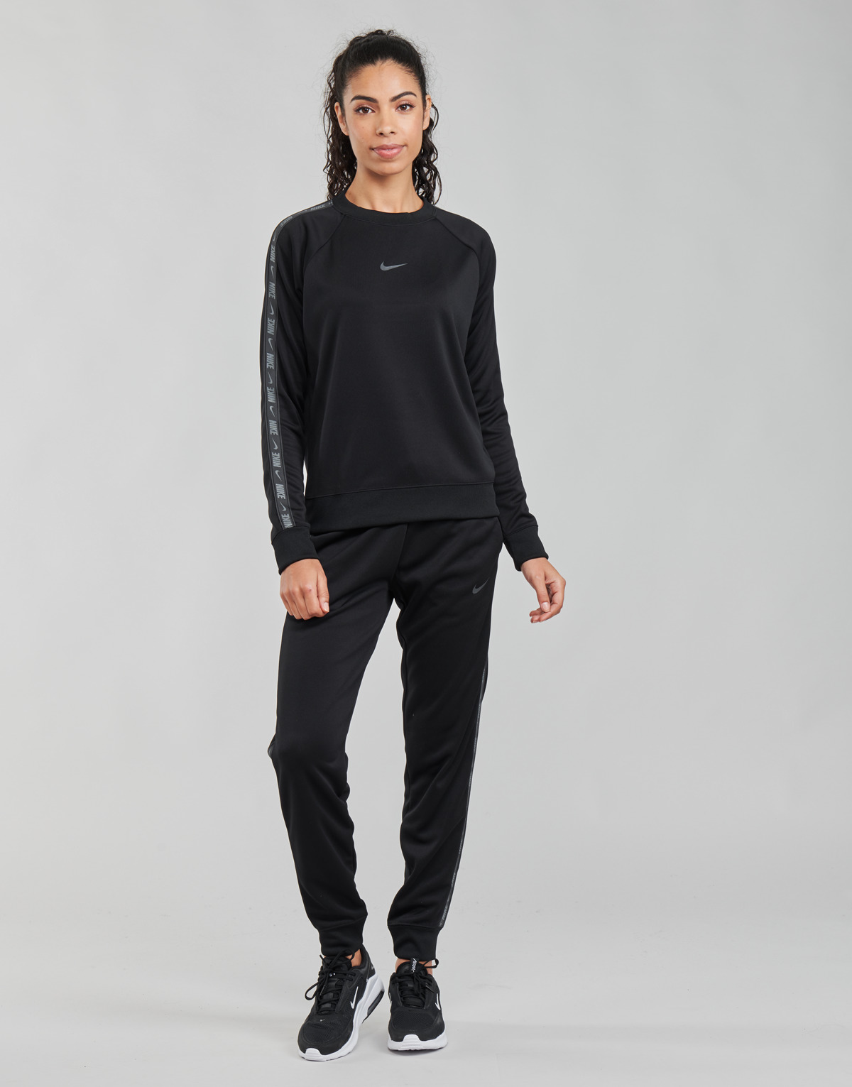 Vêtements Femme Pantalons de survêtement Nike PND W NSW PK TAPE REG PANT Noir