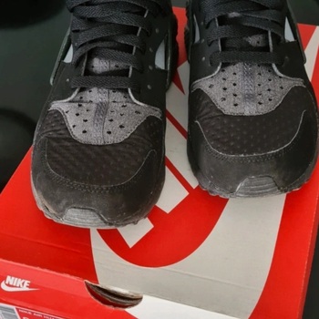 Chaussures Homme Baskets basses Nike Basket Nike Air Huarache noir et gris Noir
