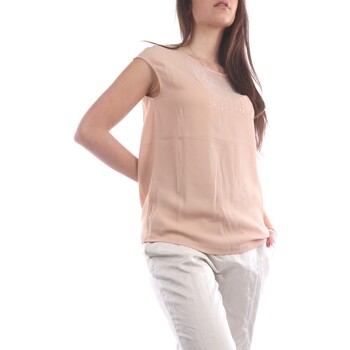 Pullover crop top boasts a scoop neckline and short sleeves